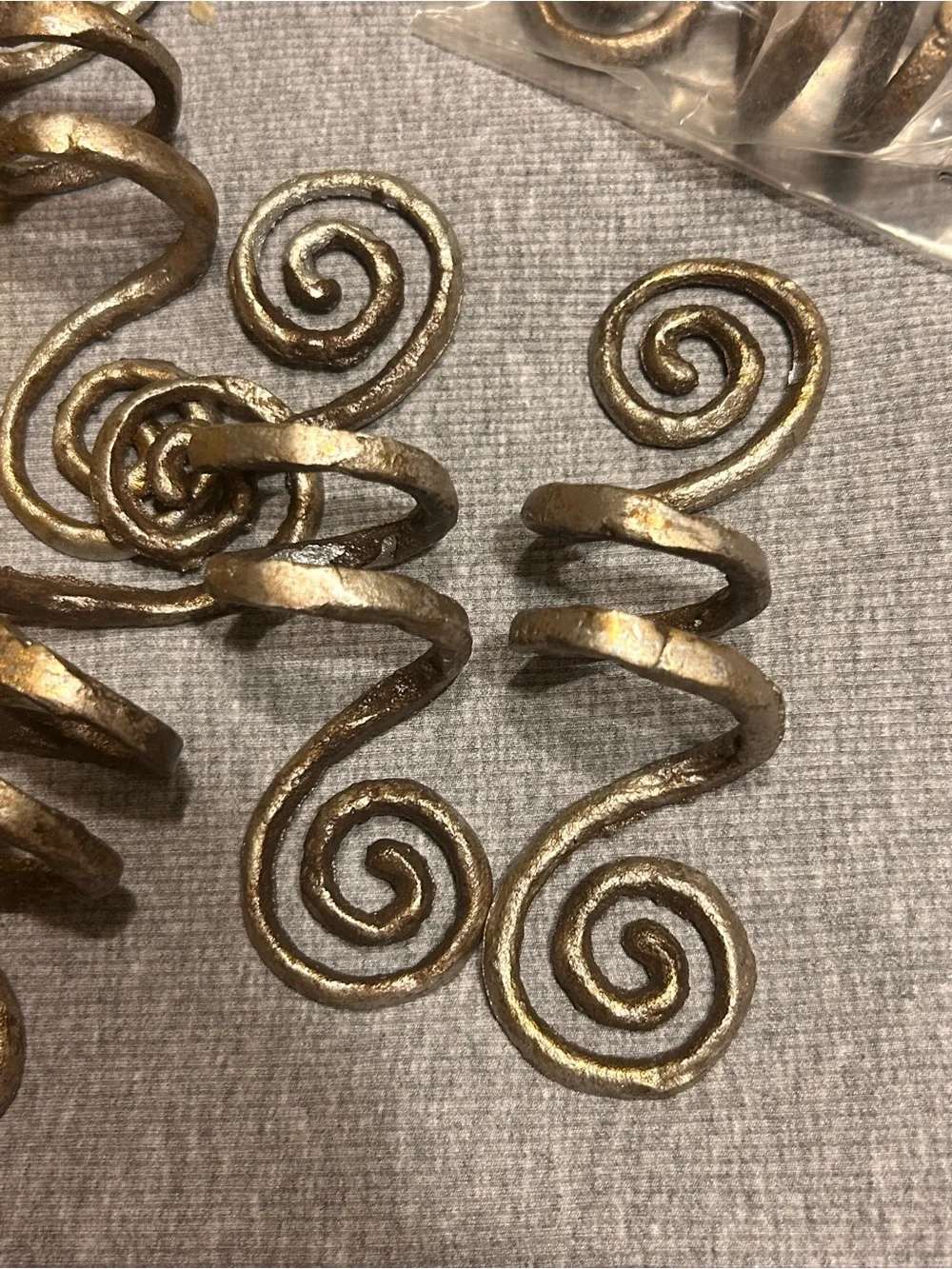 Pier one Spiral Napkin Holders silver with a golden tint set of 6